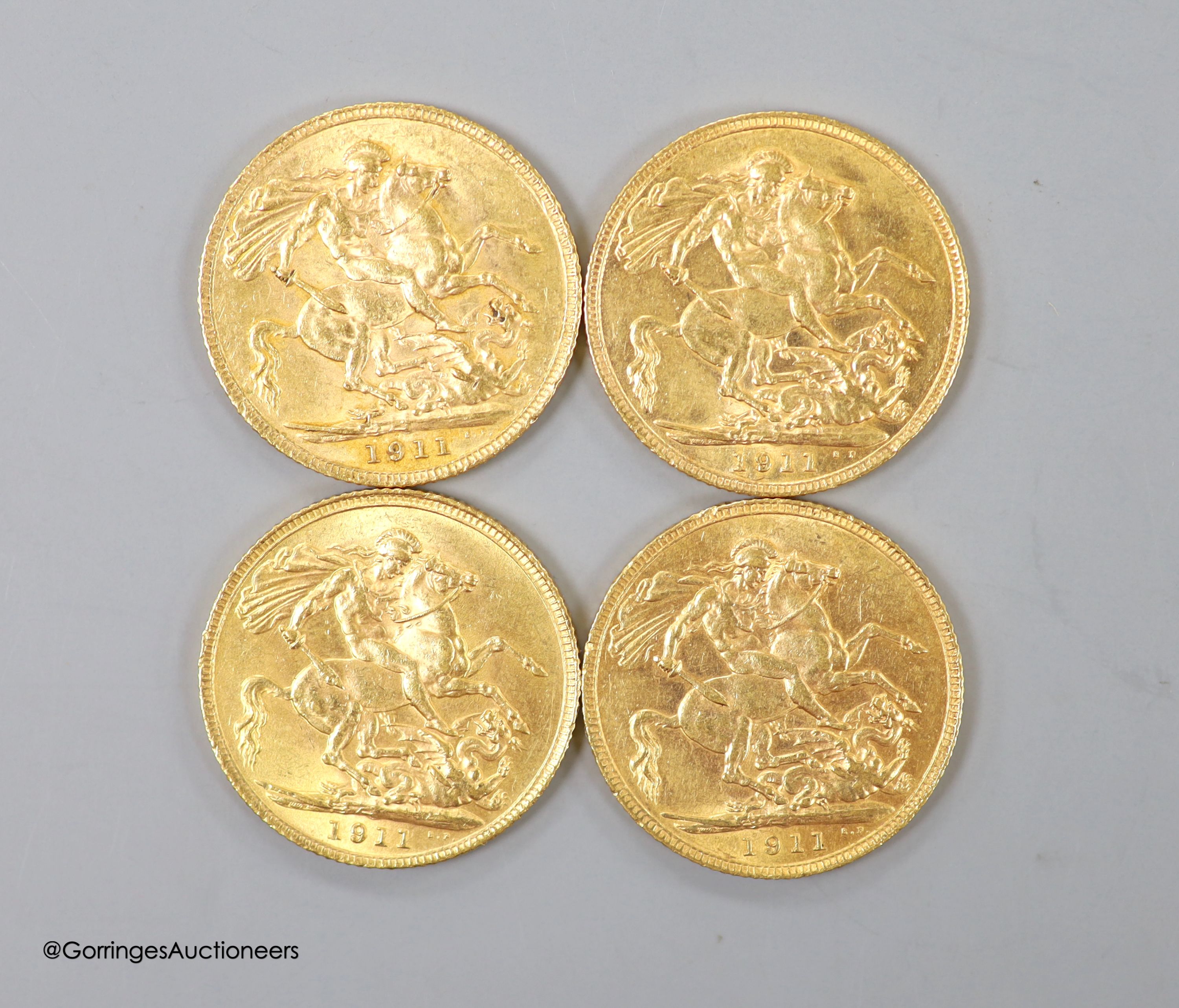 Four George V gold sovereigns, all 1911